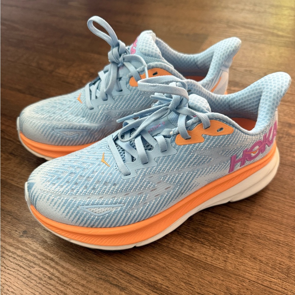 Hoka Clifton 9 women’s running shoes size 5, blue shoes with orange soles